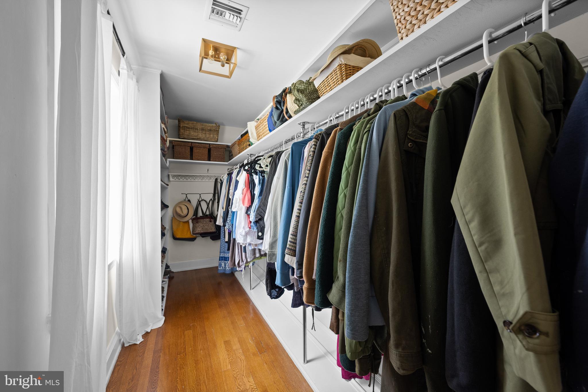 1740 Lenape Road West Chester, PA 19382 - Photo 42 of 120 a view of walk in closet with clothes and shoes