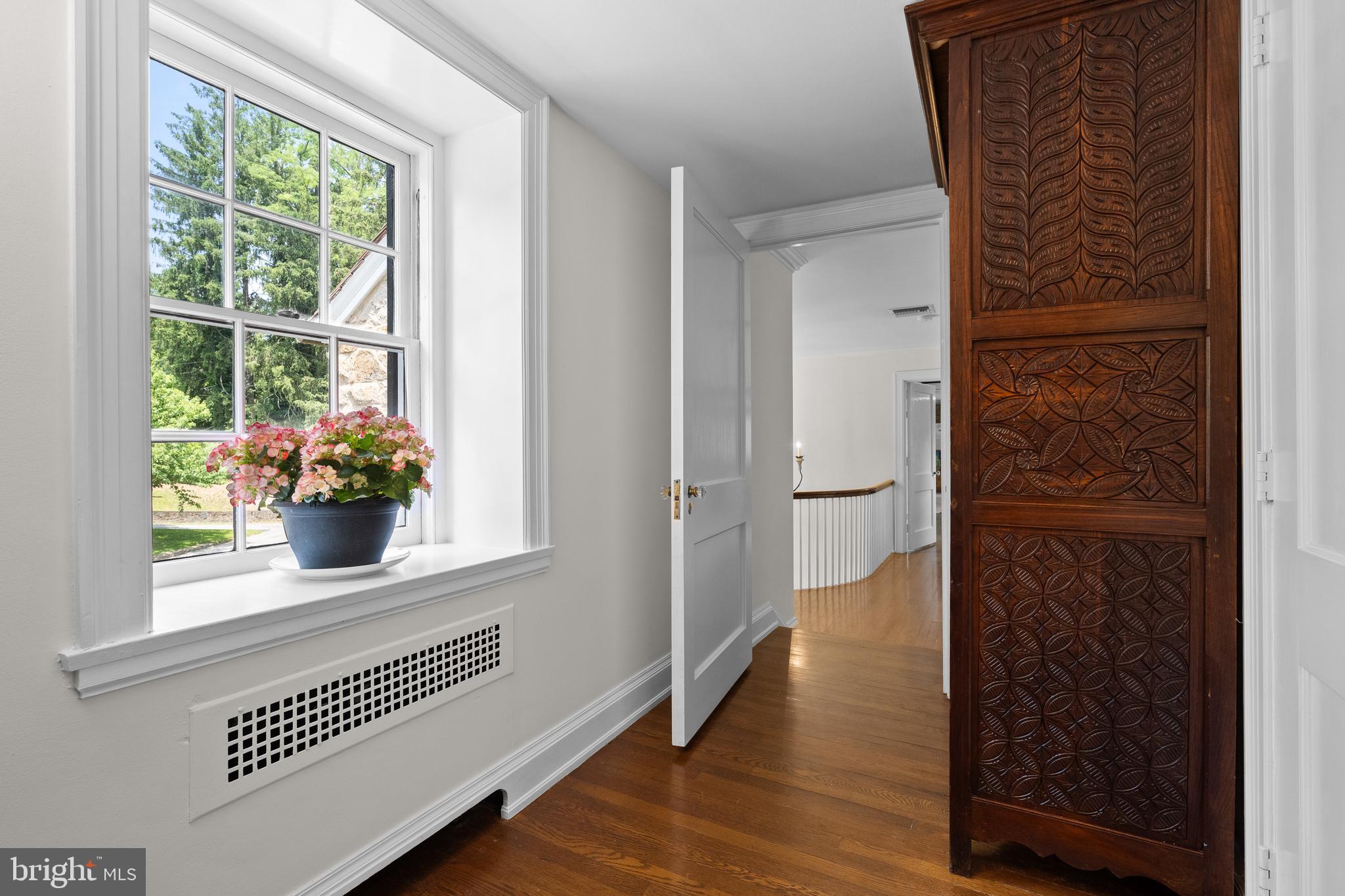 1740 Lenape Road West Chester, PA 19382 - Photo 44 of 120 a hallway with front door wooden floor and a window