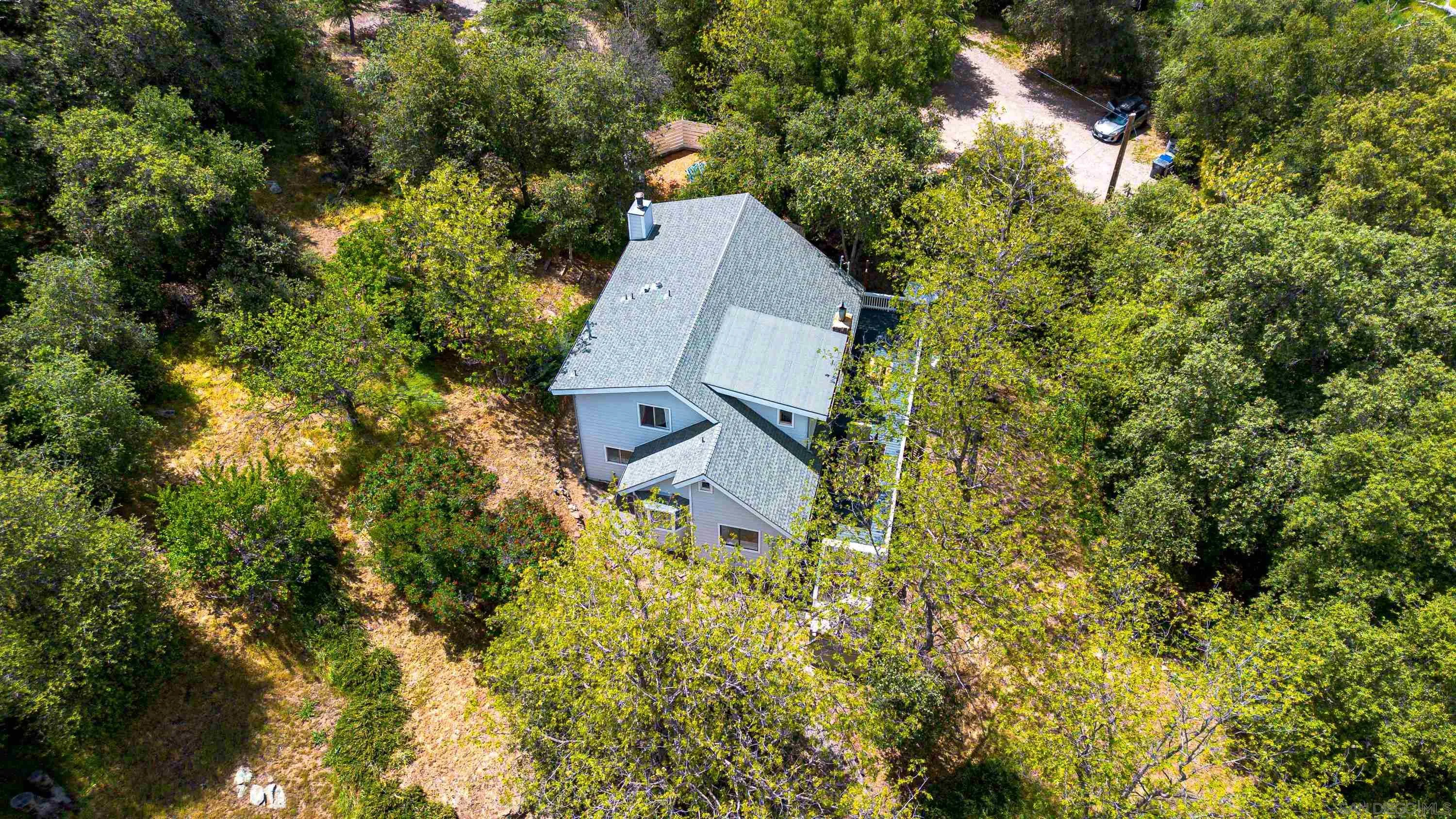 3517 Deer Lake Park Road Julian, CA 92036 - Photo 74 of 75 an aerial view of a house with swimming pool and garden space