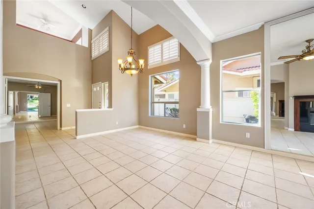 a view of an entryway with a chandelier