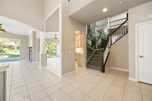 a view of an entryway with wooden floor
