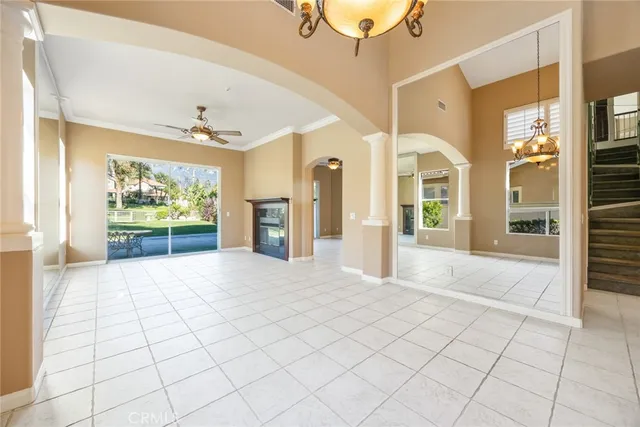 a view of an entryway with wooden floor and a rug