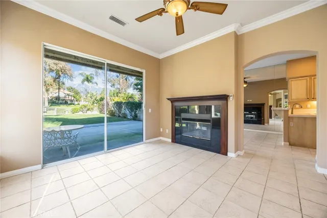 a view of livingroom with kitchen view and a window