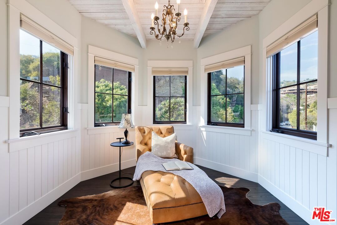 13240 Chalon Road Los Angeles, CA 90049 - Photo 24 of 46 a bed room with a bed and a chair
