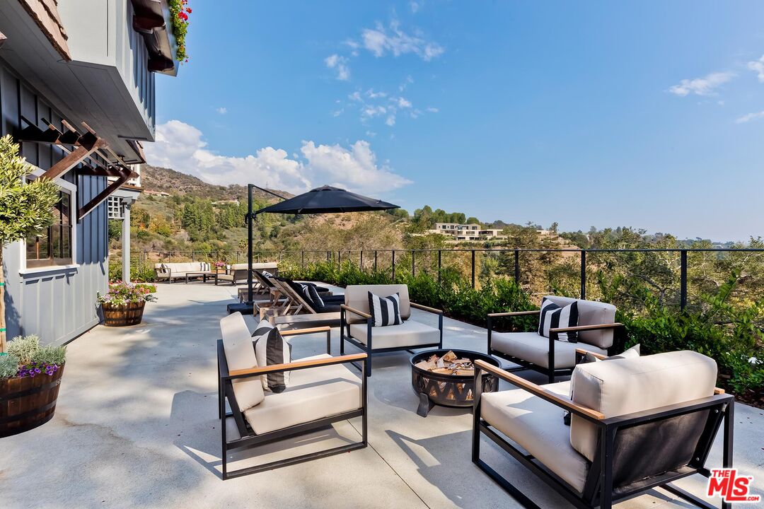 13240 Chalon Road Los Angeles, CA 90049 - Photo 3 of 46 a roof deck with patio