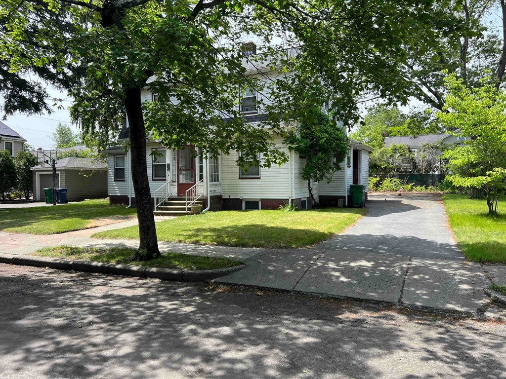 25 Kenyon Street Newton, MA 02465 - Photo 2 of 4 a view of a house with a yard