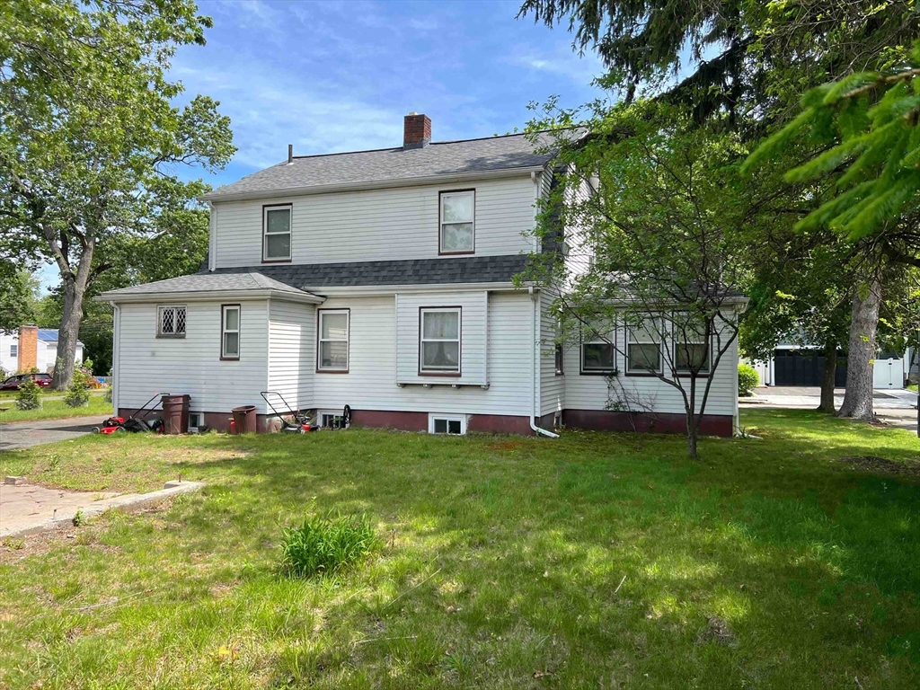 25 Kenyon Street Newton, MA 02465 - Photo 3 of 4 a view of a house with a backyard