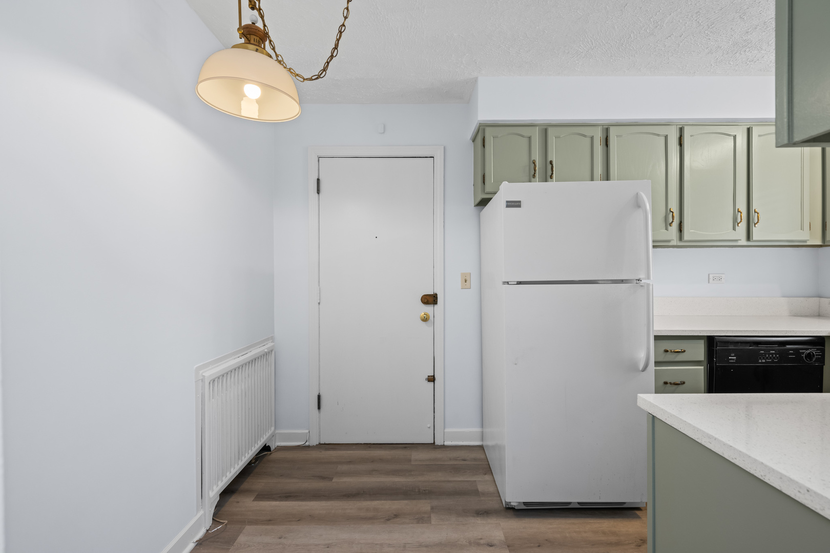 340 Ridge Avenue, Unit 1 Evanston, IL 60202 - Photo 7 of 16 a kitchen with a refrigerator and a stove