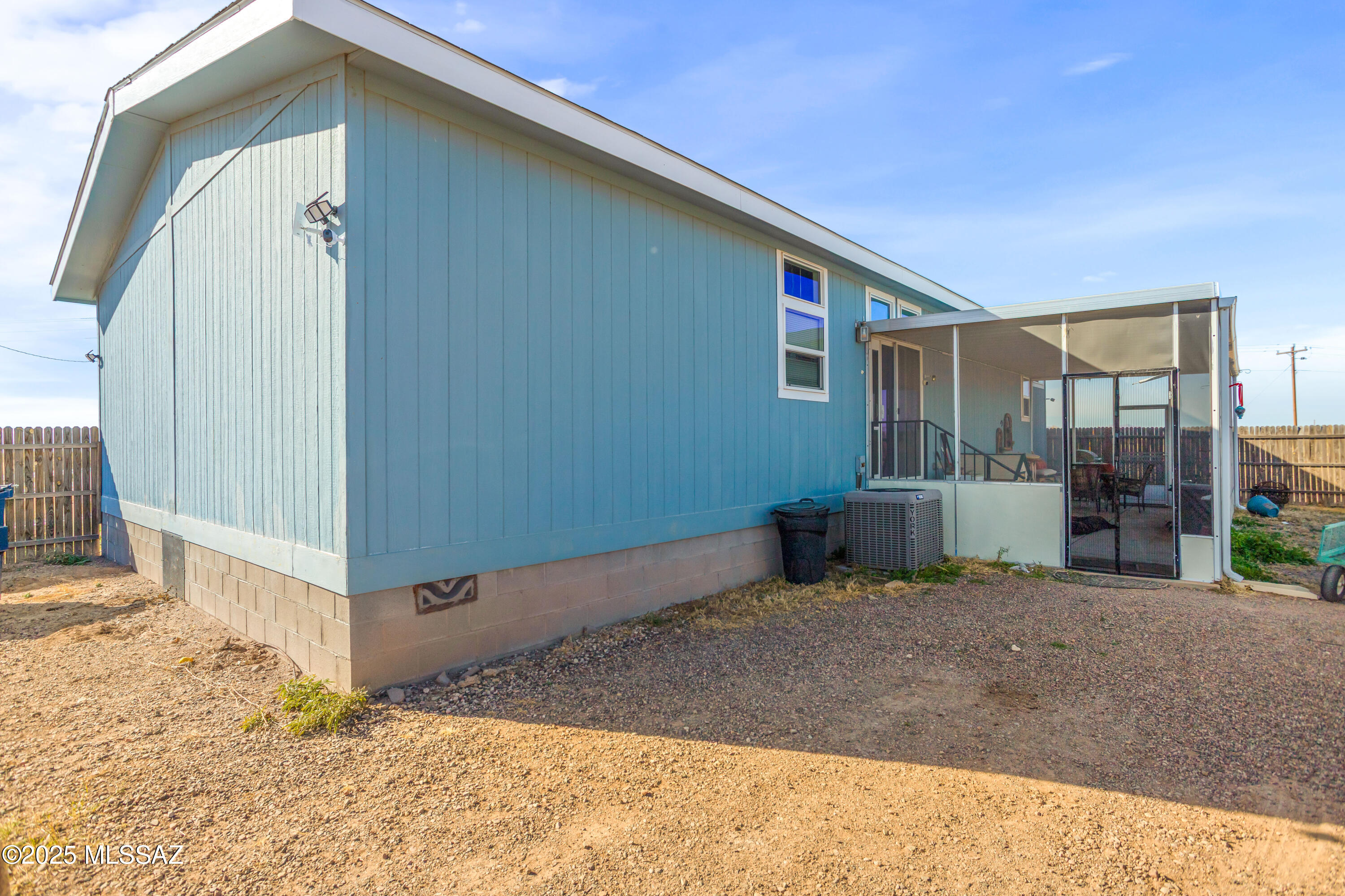 10187 North Mormon Road Elfrida, AZ 85610 - Photo 43 of 50 a view of a house with a snow in the yard
