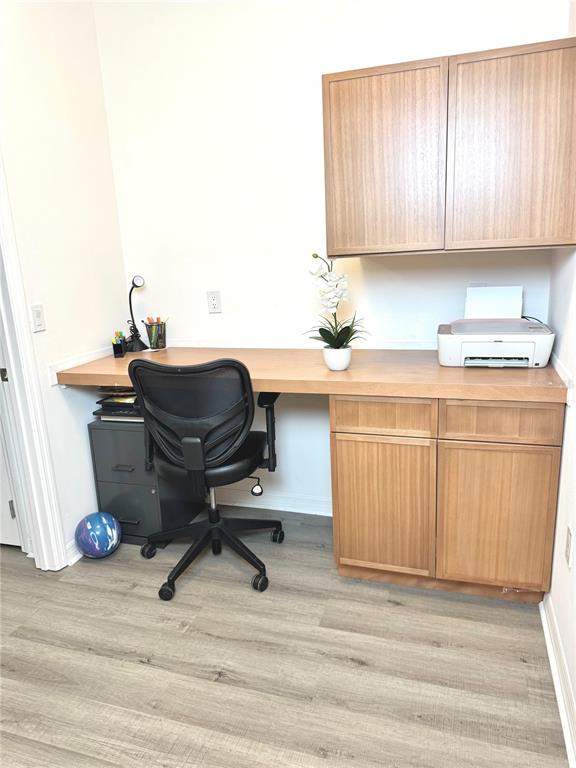 1301 Wycliffe Way St. Cloud, FL 34771 - Photo 20 of 50 a room with a chair and a piano table