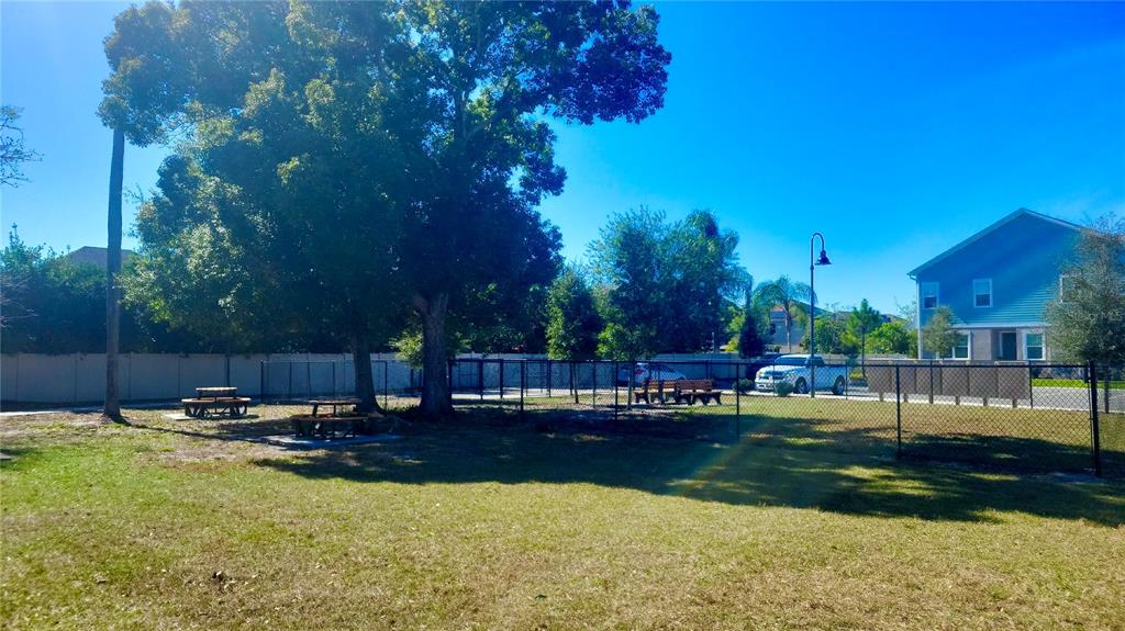 1301 Wycliffe Way St. Cloud, FL 34771 - Photo 42 of 50 a view of a lake with houses