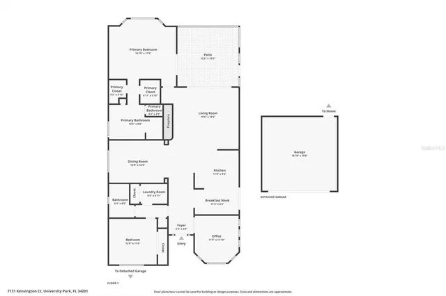 an aerial view of a house with a garden and lake view