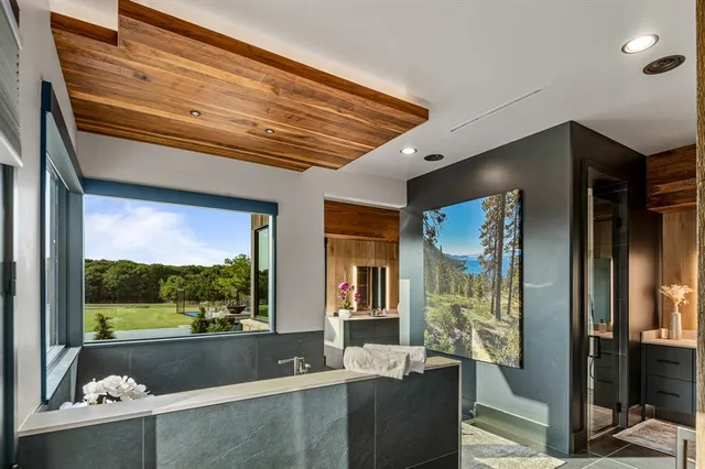 a living room with large windows