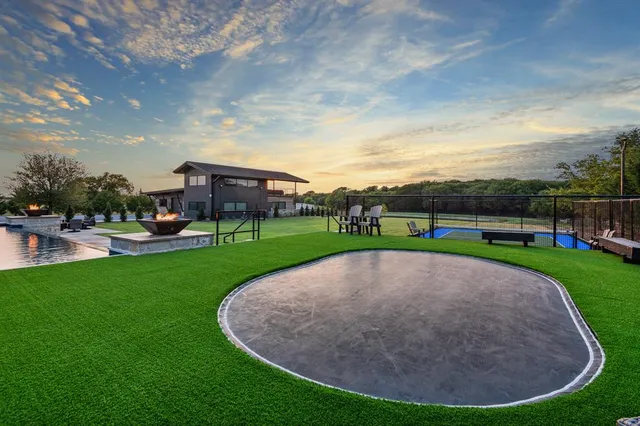 a view of outdoor space with garden and deck