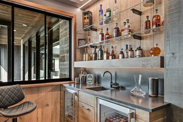 a kitchen with a sink and a window