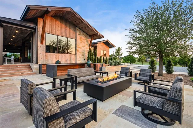 a outdoor living space with patio furniture and a potted plant