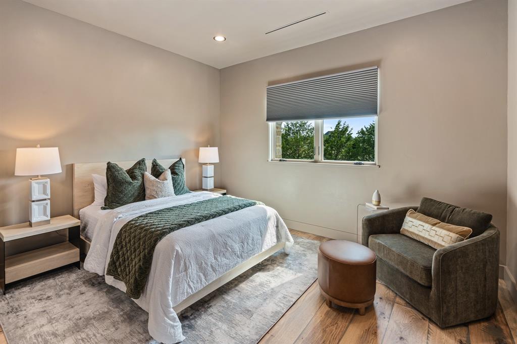 988 English Road Rockwall, TX 75032 - Photo 32 of 40 a bedroom with a bed and window