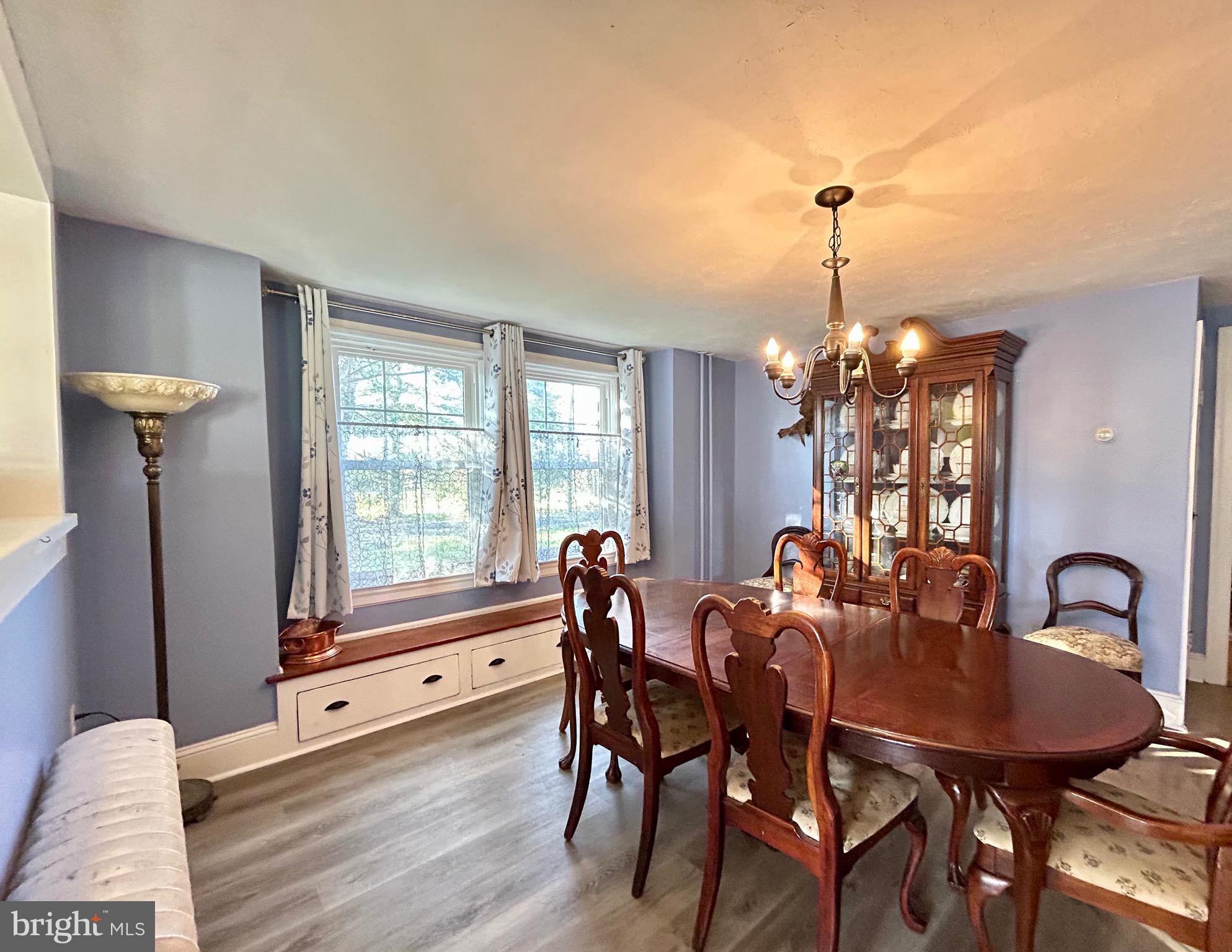 2415 Second Street Pike Newtown, PA 18940 - Photo 11 of 51 a view of a dining room with furniture window and wooden floor