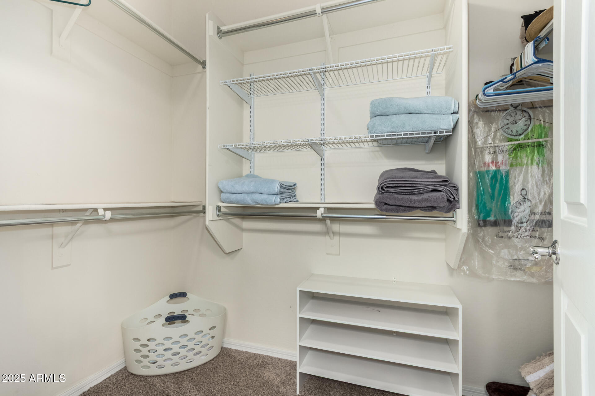 7253 West Cinder Brook Way Florence, AZ 85132 - Photo 26 of 72 a kitchen with a refrigerator and cabinets
