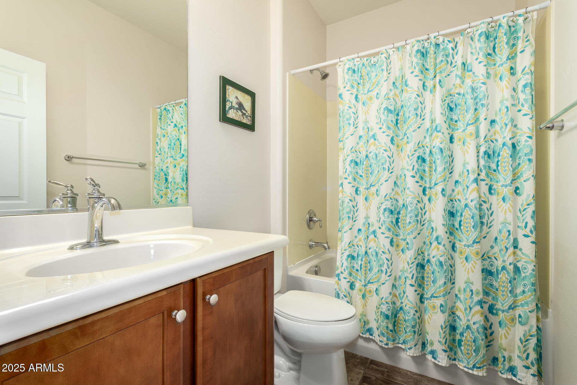 7253 West Cinder Brook Way Florence, AZ 85132 - Photo 29 of 72 a bathroom with a sink a toilet and a mirror