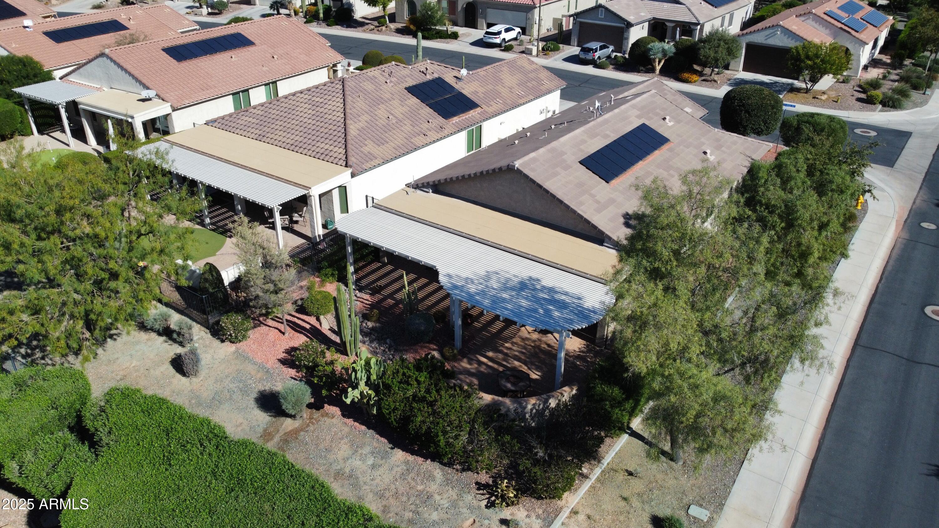 7253 West Cinder Brook Way Florence, AZ 85132 - Photo 35 of 72 an aerial view of a house with a yard