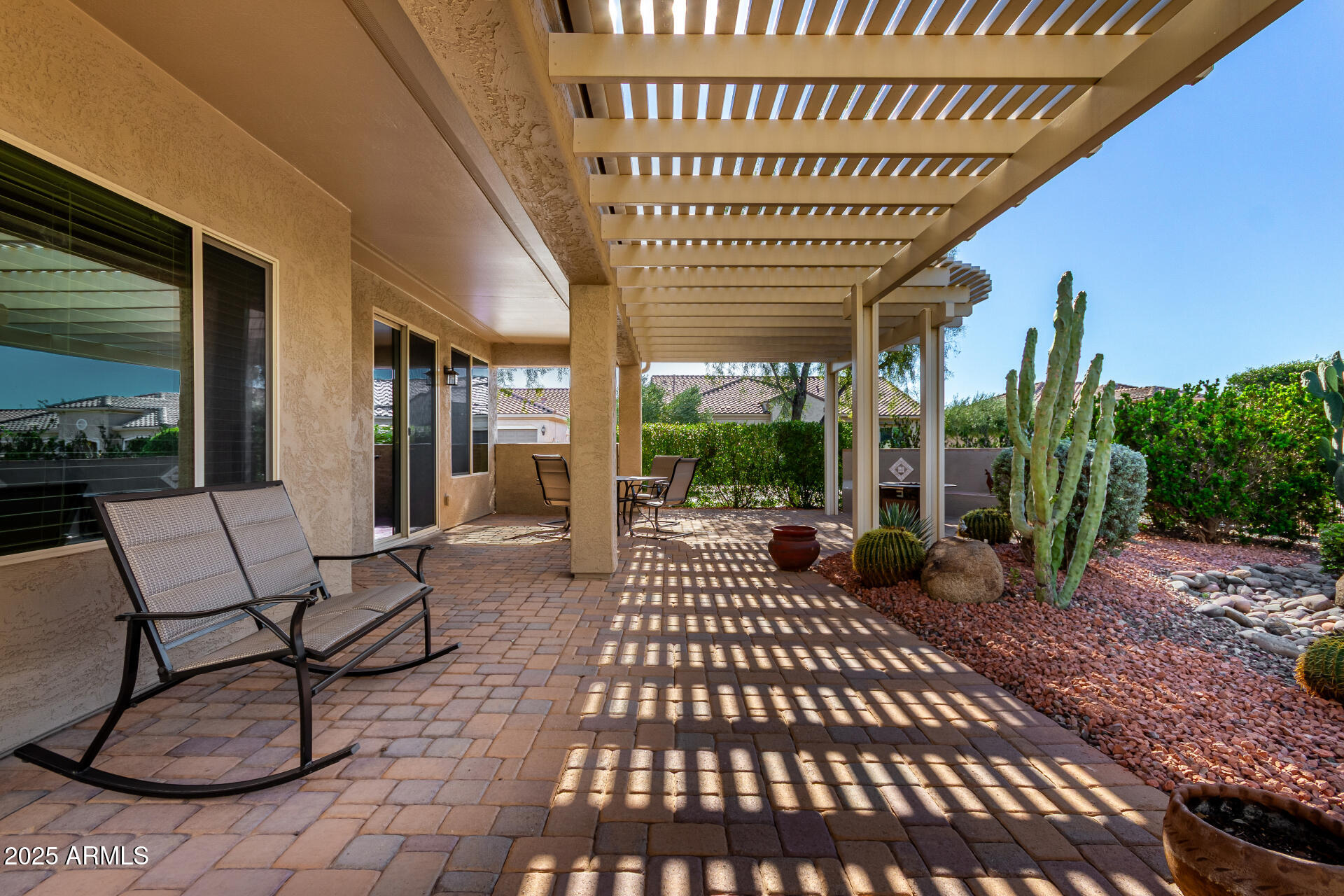 7253 West Cinder Brook Way Florence, AZ 85132 - Photo 37 of 72 a view of a porch with furniture
