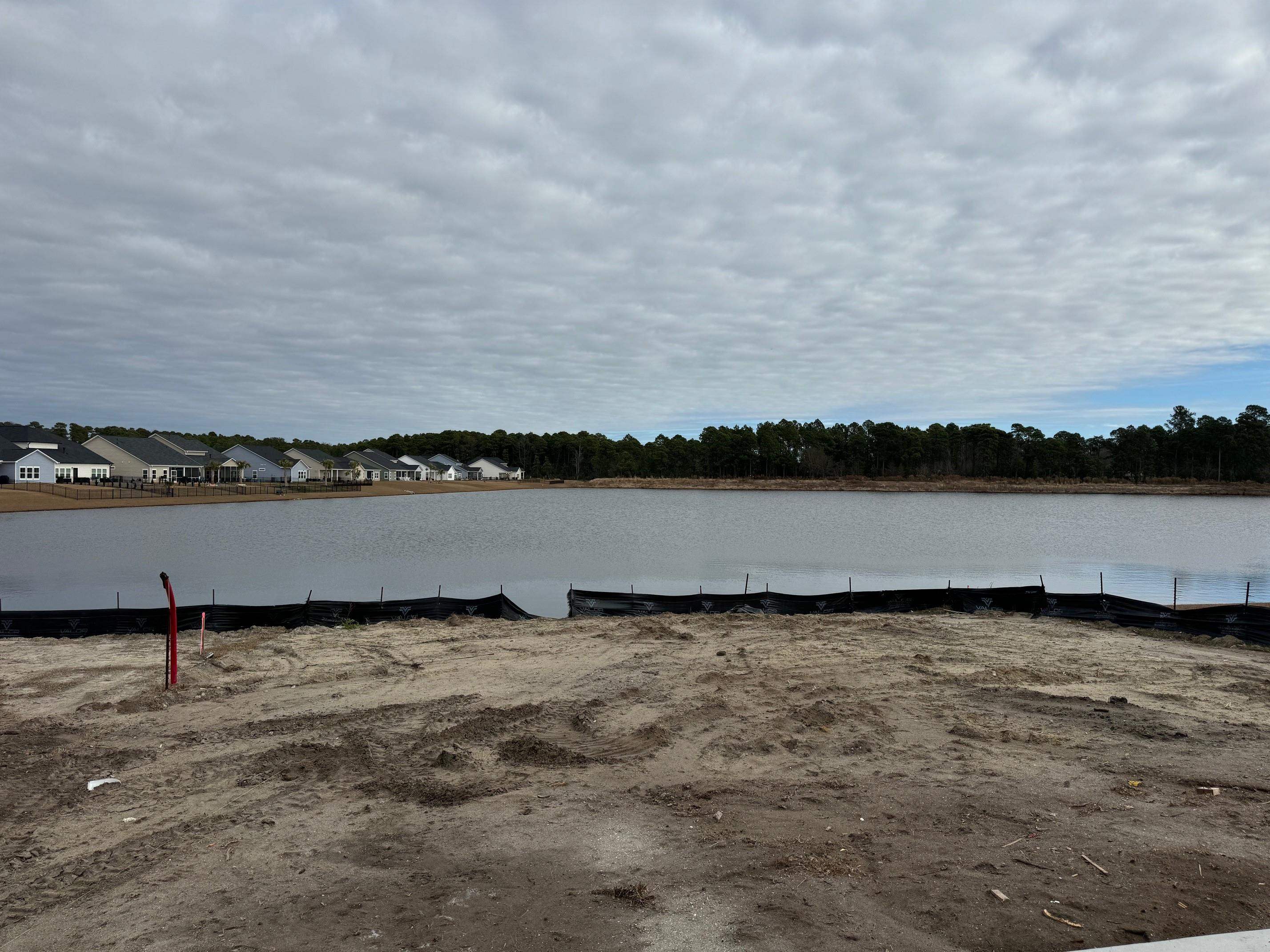 803 Laconic Drive Myrtle Beach, SC 29588 - Photo 19 of 21 Dock area featuring a water view and a residential view