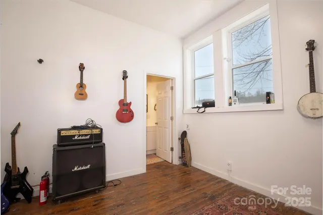 a view of a entryway with wooden floor