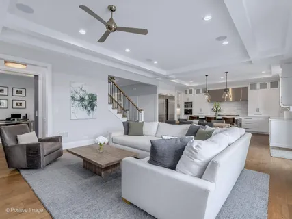 a living room with furniture fireplace and a flat screen tv