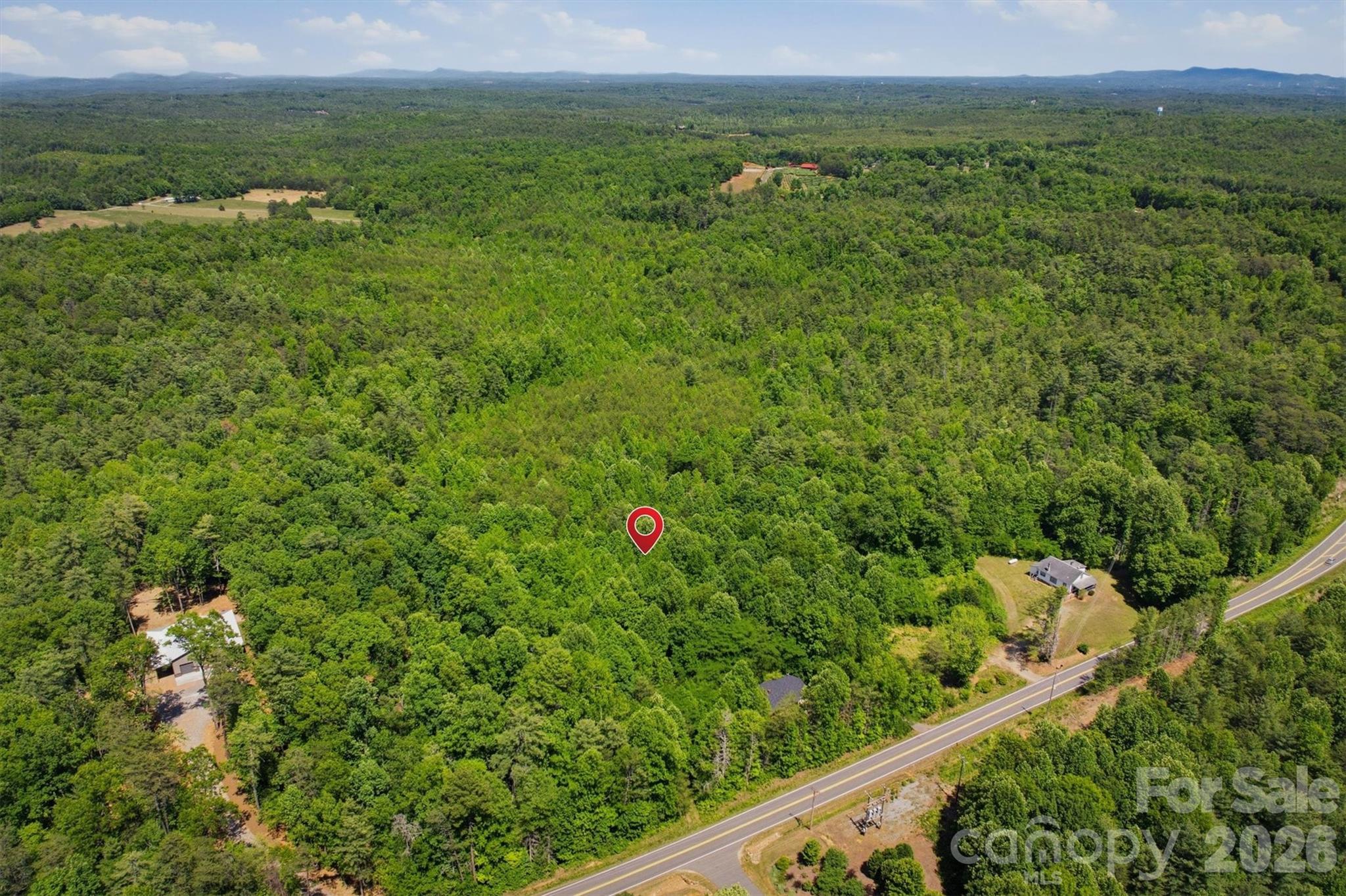0 Nc 126 Road Morganton, NC 28655 - Photo 3 of 5 a view of a green field with an outdoor space