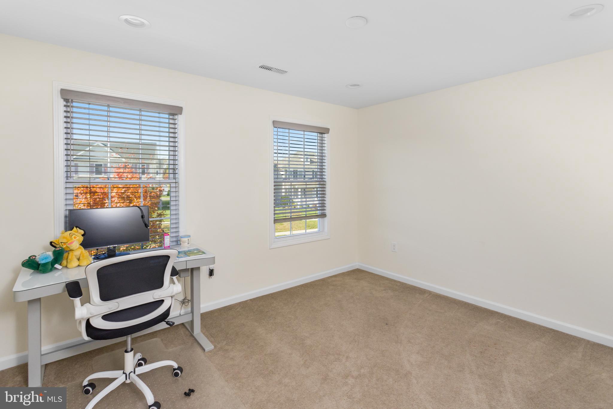 36 Brookdale Way Chesterfield, NJ 08515 - Photo 32 of 52 a workspace with furniture and a window