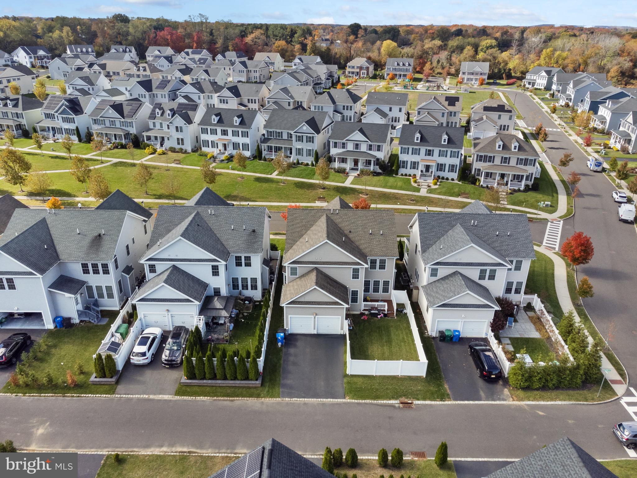 36 Brookdale Way Chesterfield, NJ 08515 - Photo 49 of 52 an aerial view of residential houses with outdoor space and swimming pool
