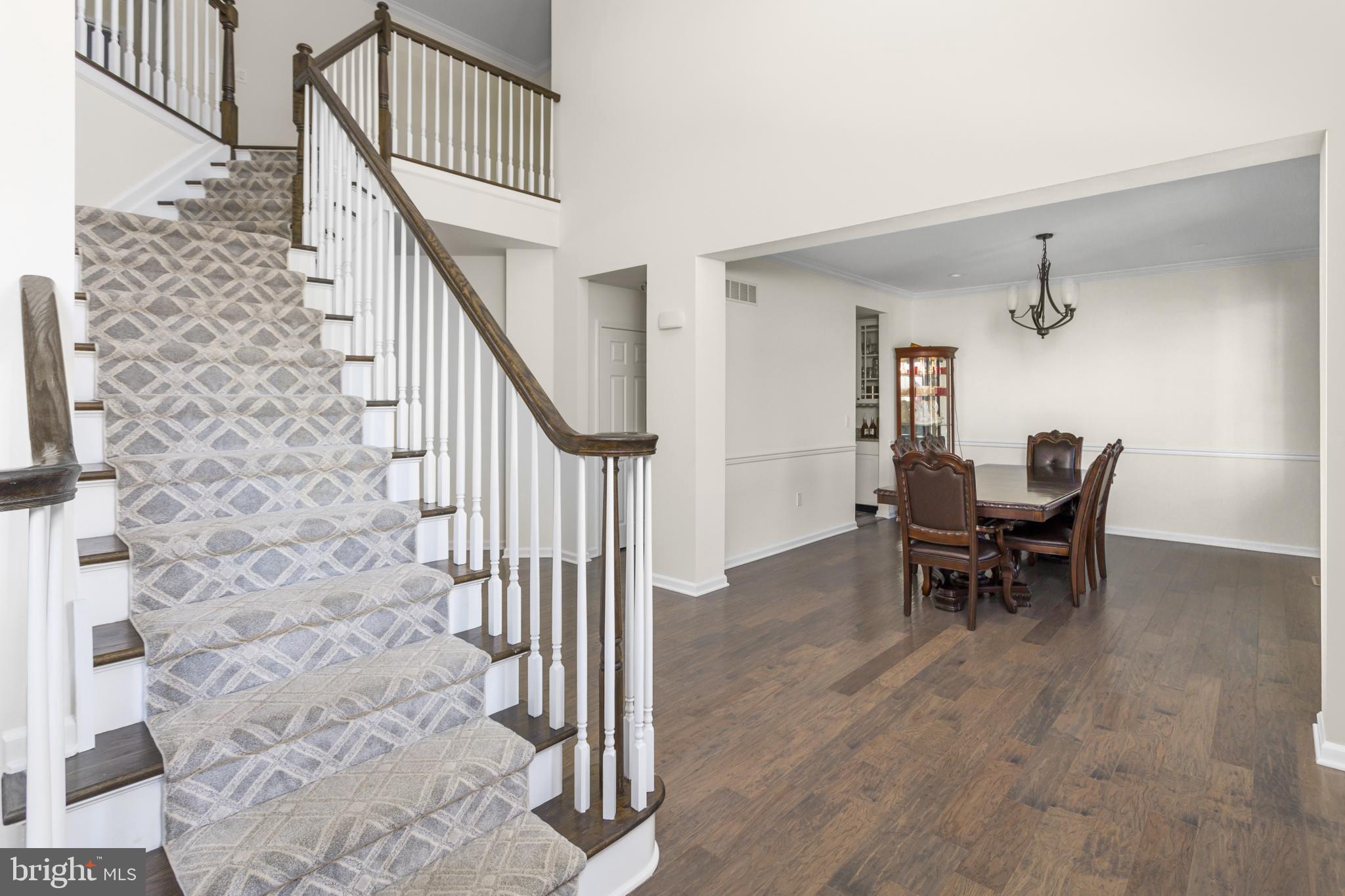 36 Brookdale Way Chesterfield, NJ 08515 - Photo 8 of 52 a dining room with furniture and wooden floor