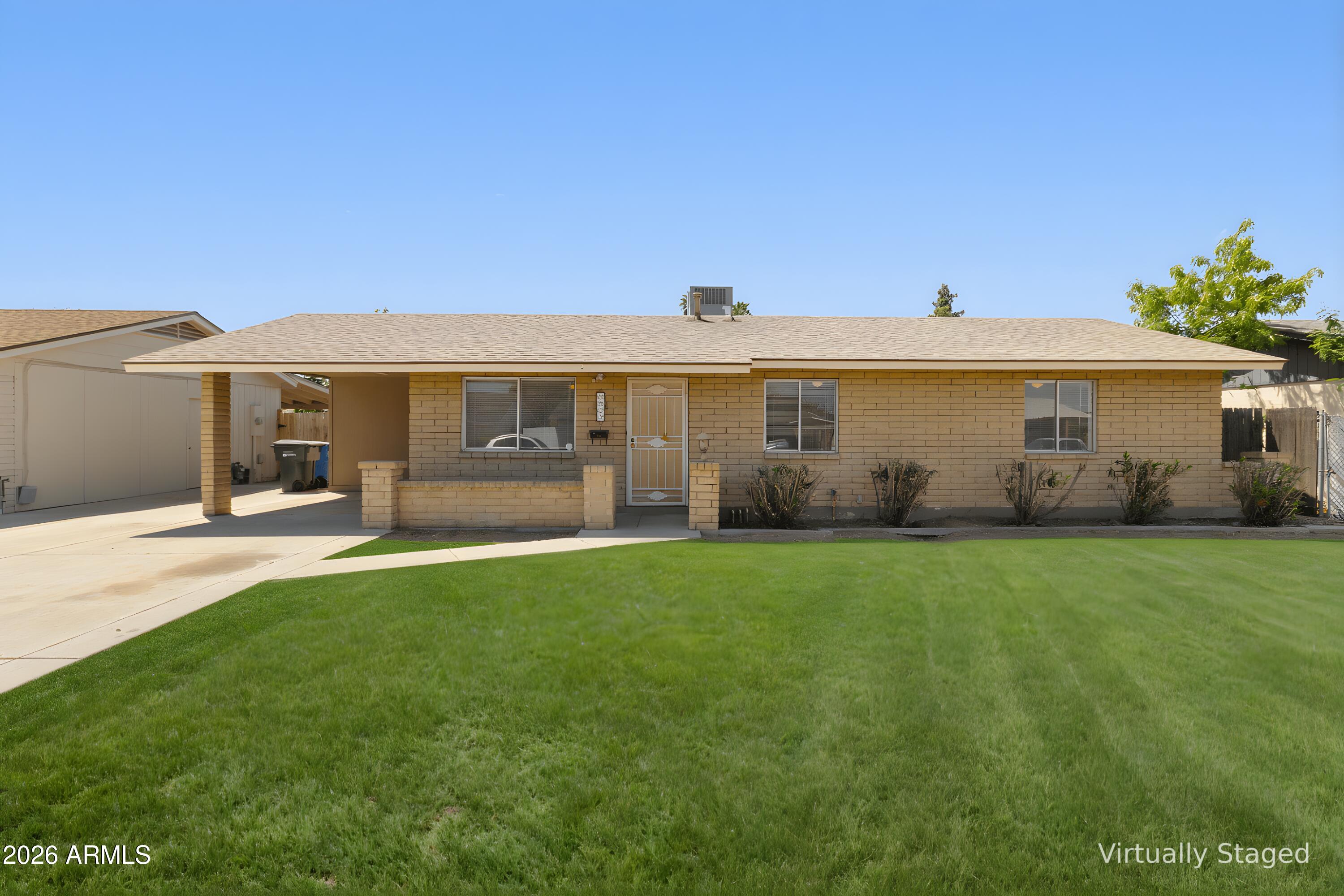 8825 West Roma Avenue Phoenix, AZ 85037 - Photo 1 of 21 Front, Virtually Enhanced