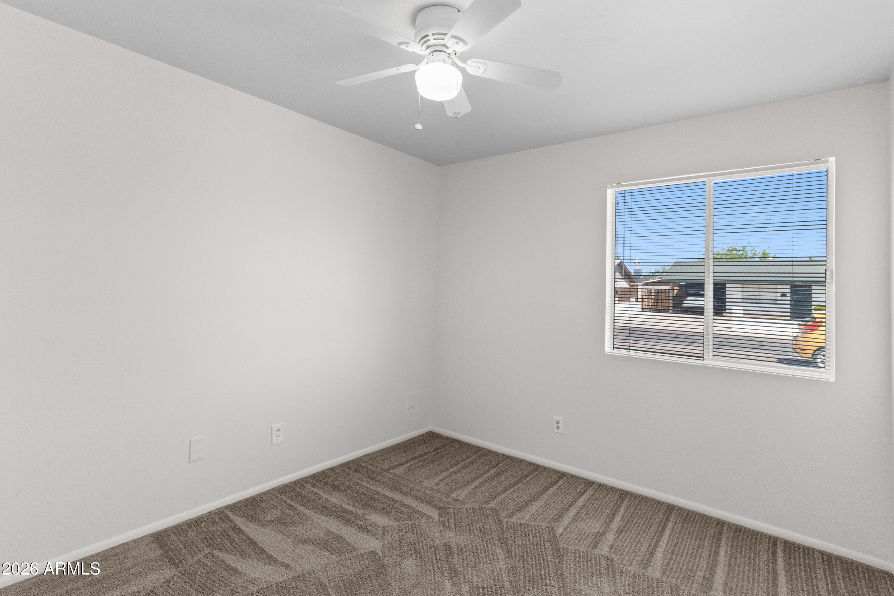 8825 West Roma Avenue Phoenix, AZ 85037 - Photo 17 of 21 Bedroom 2