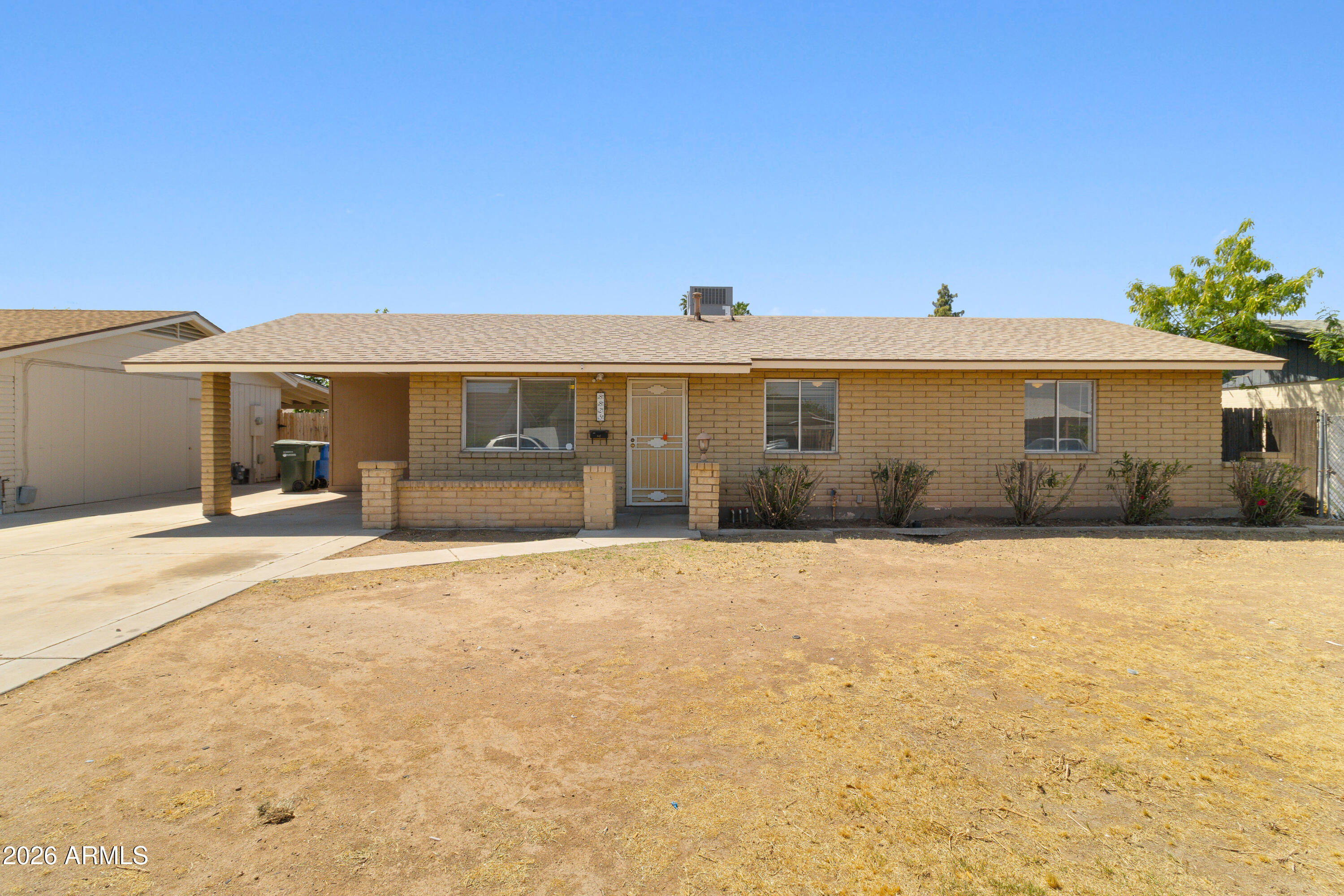 8825 West Roma Avenue Phoenix, AZ 85037 - Photo 2 of 21 Front