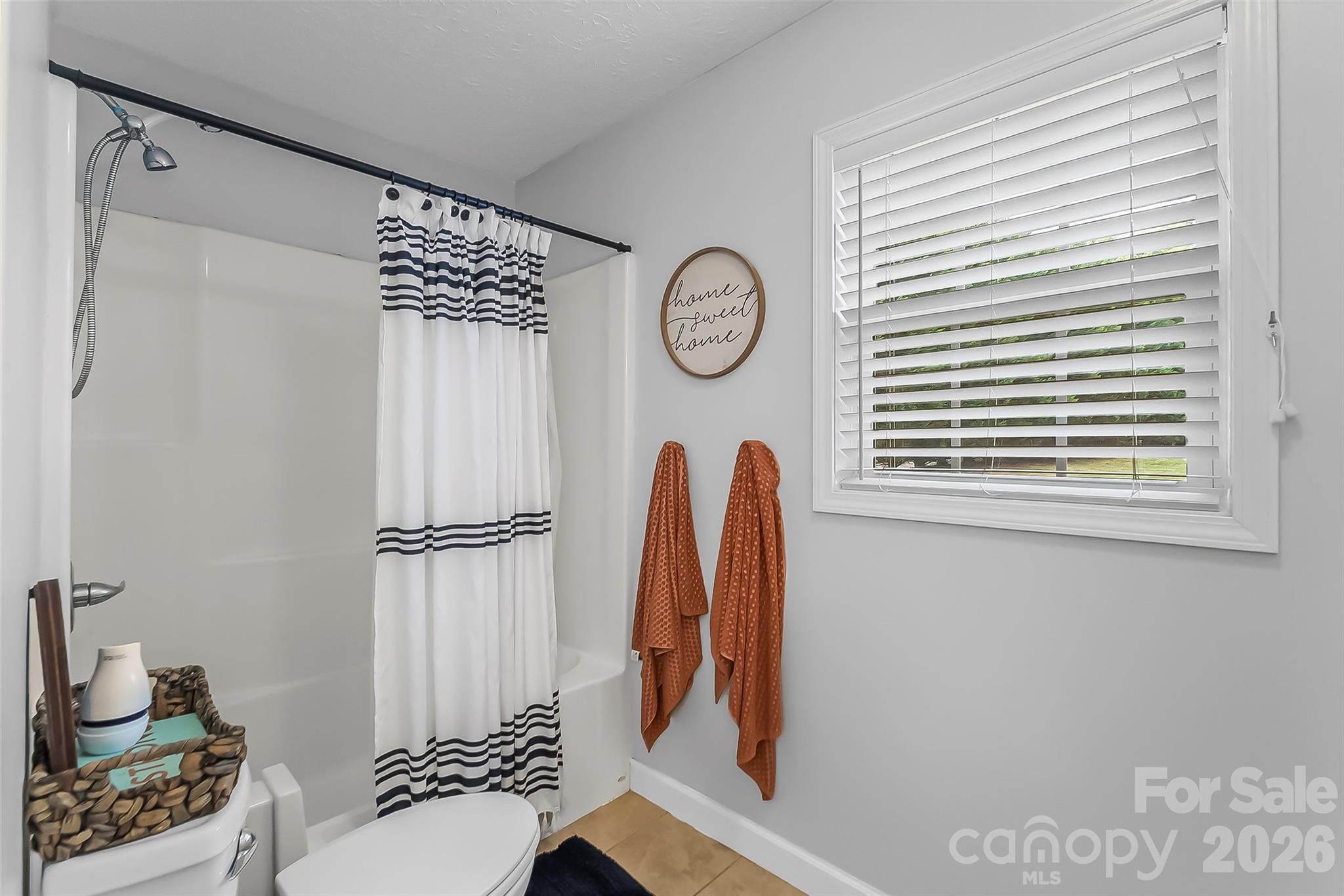 1498 Salem Road Morganton, NC 28655 - Photo 19 of 32 a view of walk in closet with clothes and shoes
