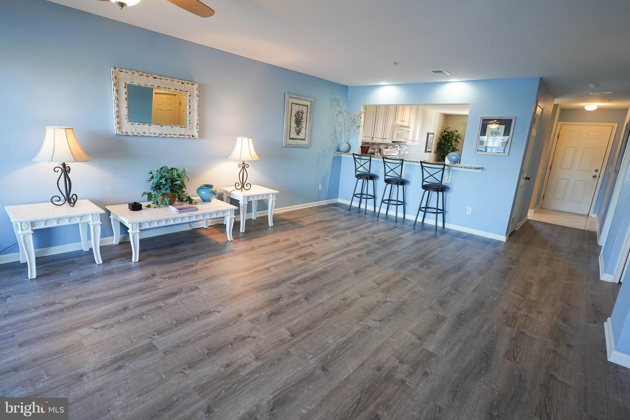 37182 Harbor Drive, Unit 264 Ocean View, DE 19970 - Photo 14 of 55 a living room with furniture and a wooden floor