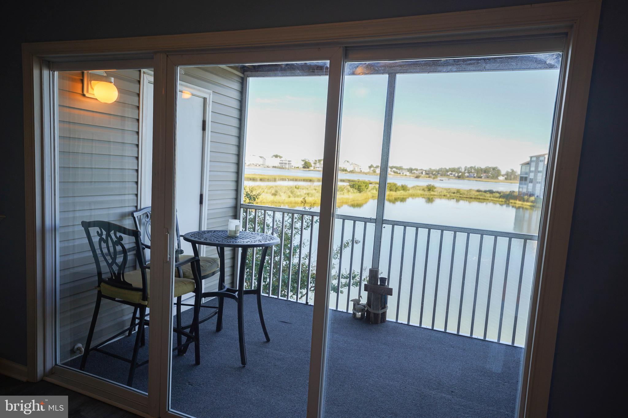 37182 Harbor Drive, Unit 264 Ocean View, DE 19970 - Photo 15 of 55 a view of a room with a table and chairs