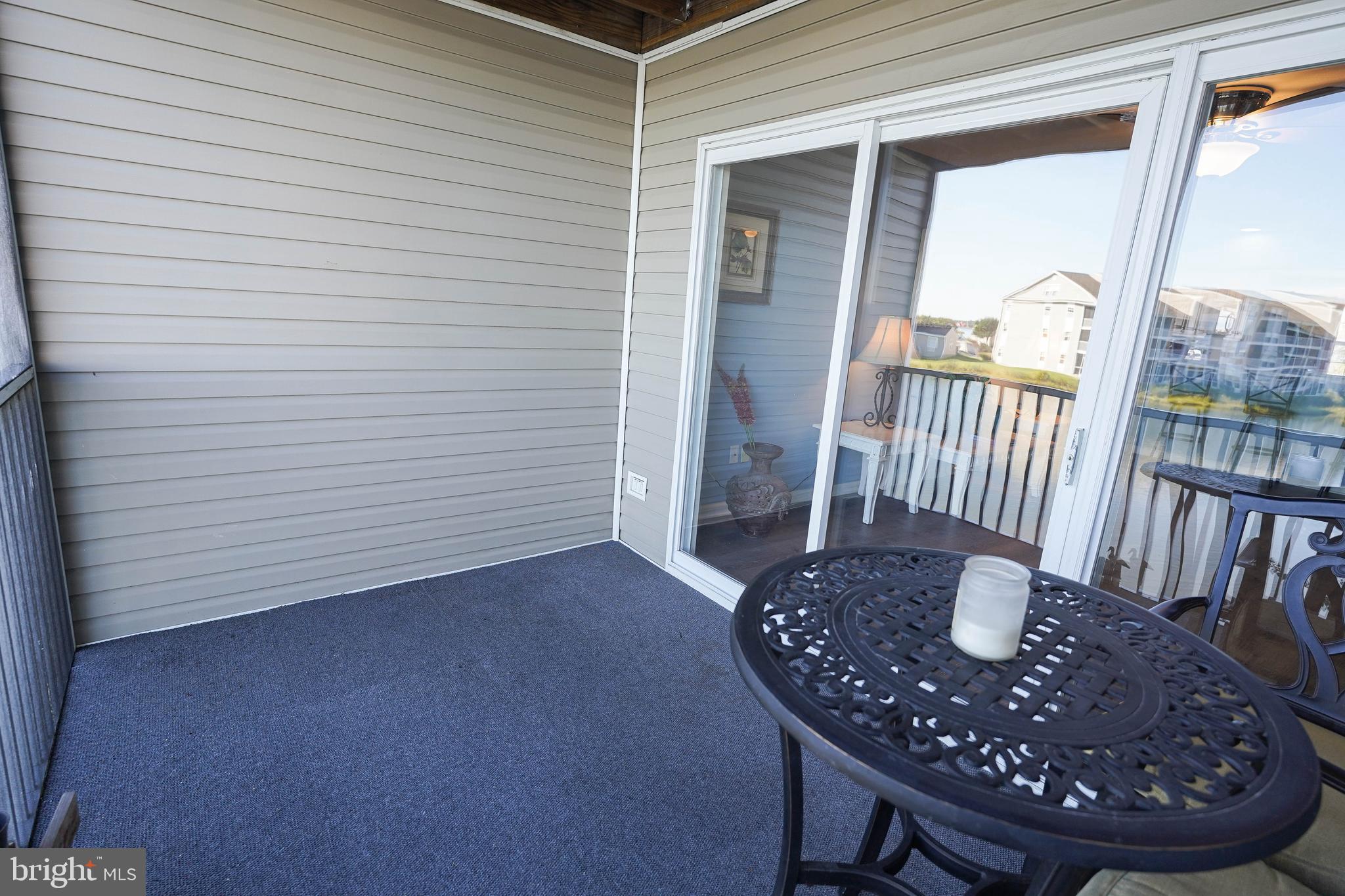 37182 Harbor Drive, Unit 264 Ocean View, DE 19970 - Photo 17 of 55 a view of a porch with furniture