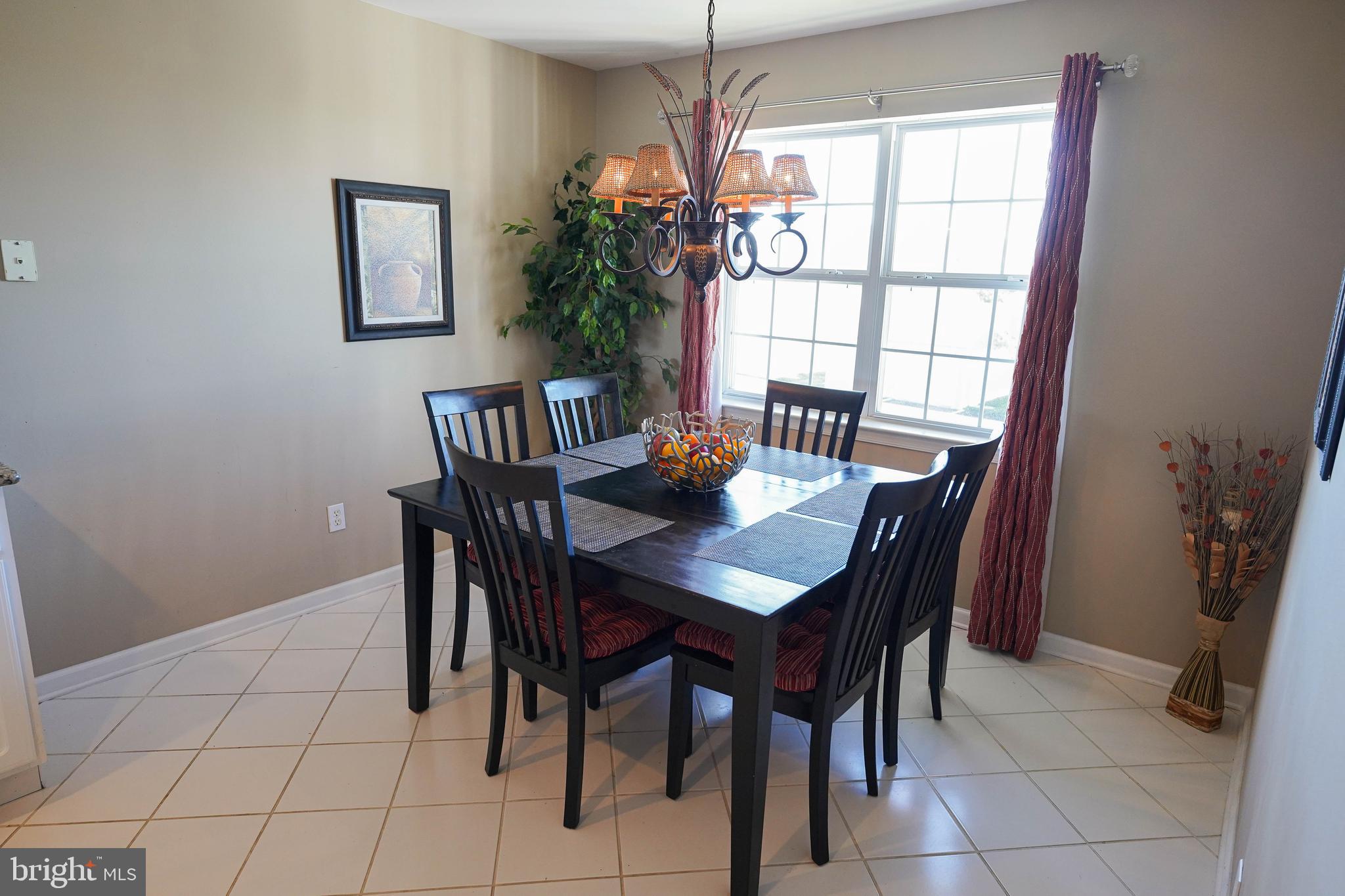 37182 Harbor Drive, Unit 264 Ocean View, DE 19970 - Photo 23 of 55 a view of a dining room with furniture and window