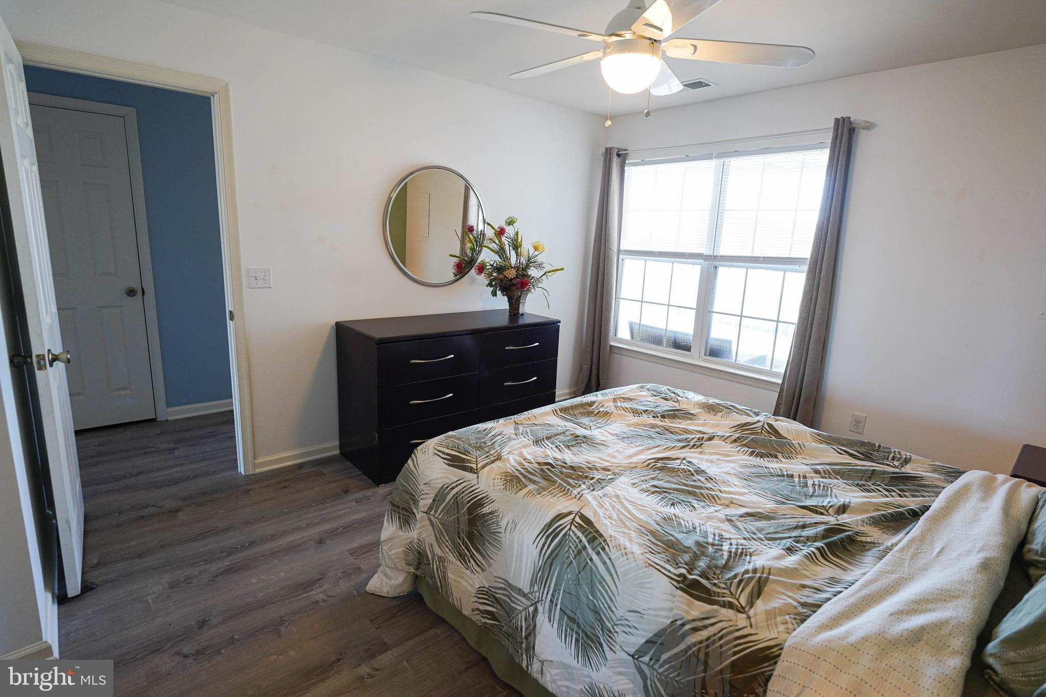 37182 Harbor Drive, Unit 264 Ocean View, DE 19970 - Photo 47 of 55 a bedroom with a bed and a dresser
