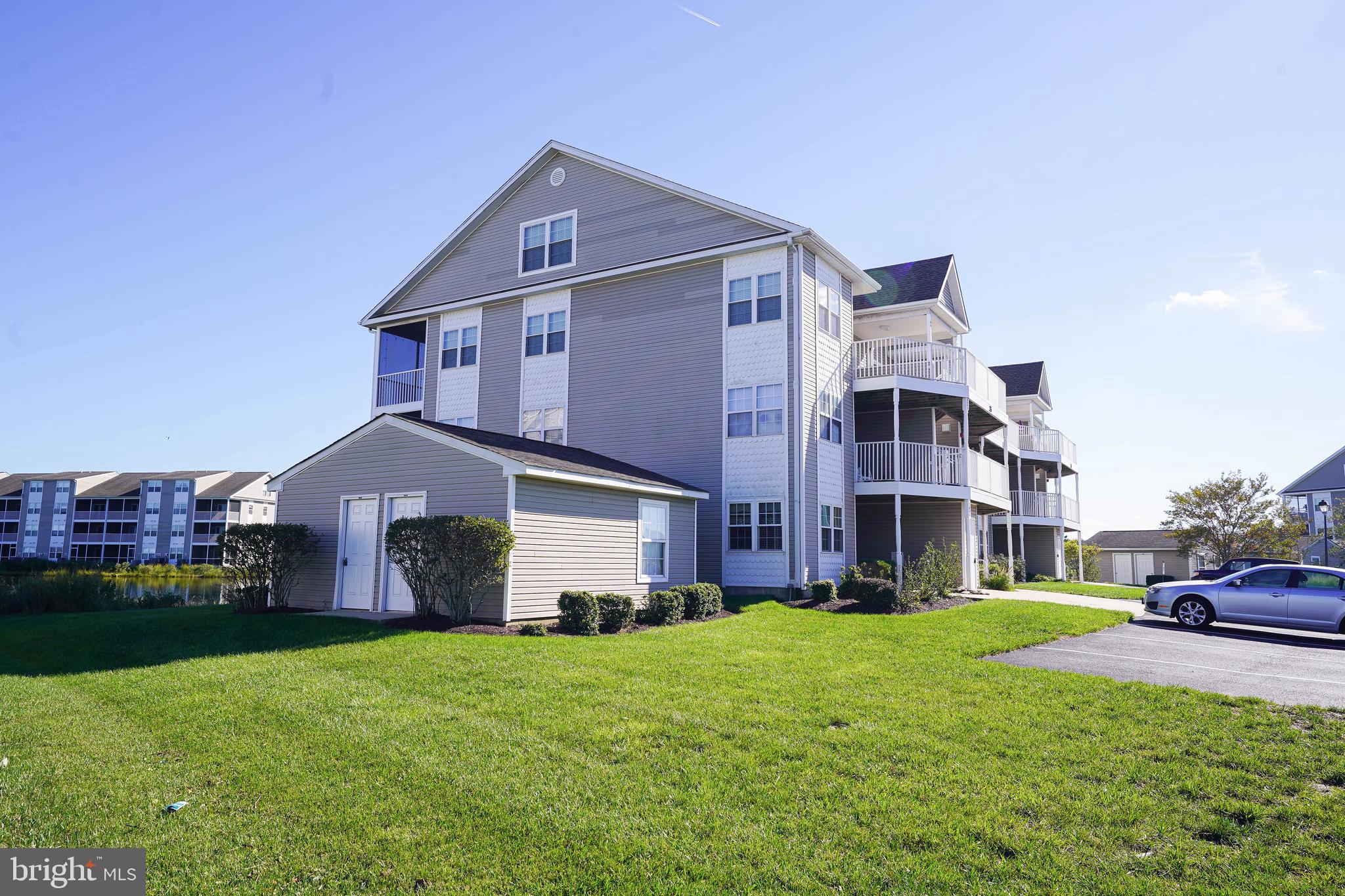 37182 Harbor Drive, Unit 264 Ocean View, DE 19970 - Photo 53 of 55 a front view of house with yard and green space