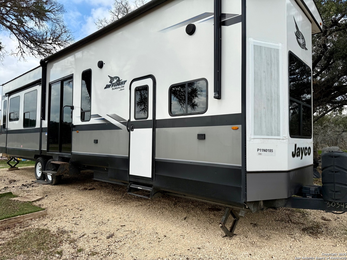 1400 Knoll Schwope Road Spring Branch, TX 78070 - Photo 11 of 12 a front view of a house with a yard