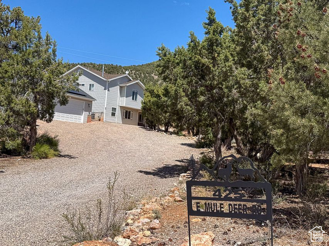 425 East Mule Deer Road Central, UT 84722 - Photo 60 of 72 View of property hidden behind natural elements with gravel driveway