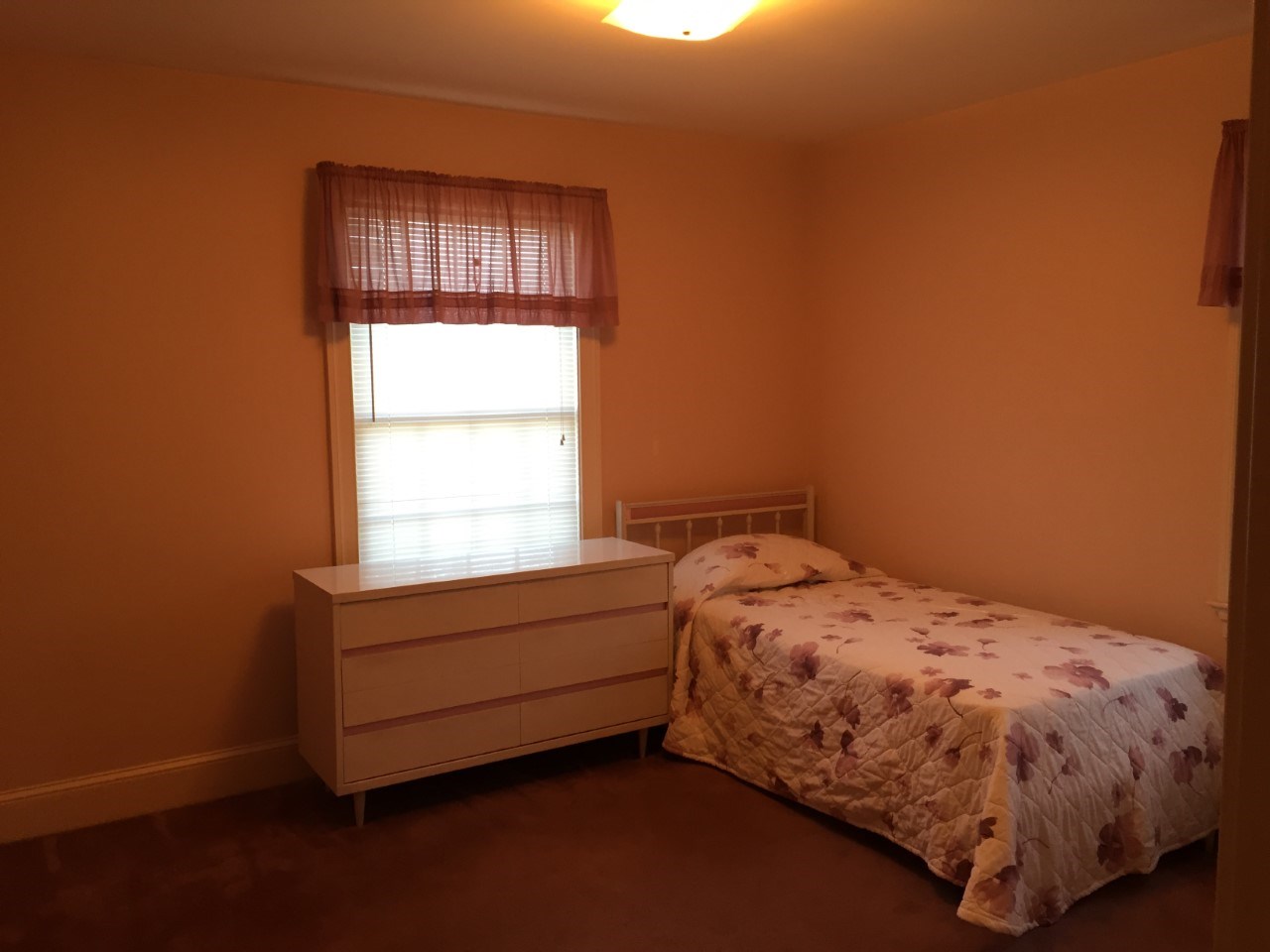 1778 Long Meadow Road Waynesboro, VA 22980 - Photo 13 of 29 a bed sitting in a bedroom next to a window