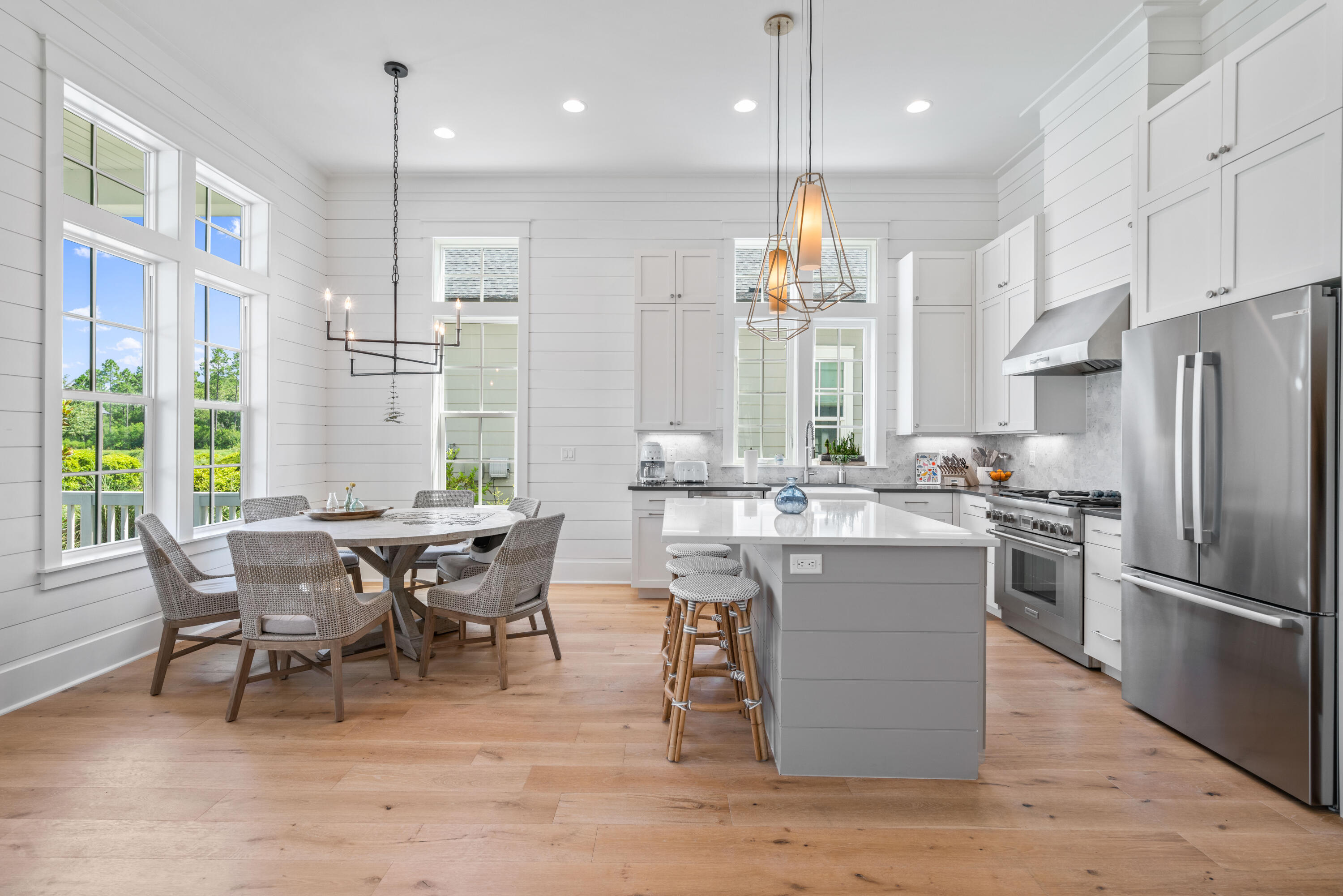 888 Pathways Dr Inlet Beach Inlet Beach, FL 32461 - Photo 15 of 43 a large kitchen with a table and chairs