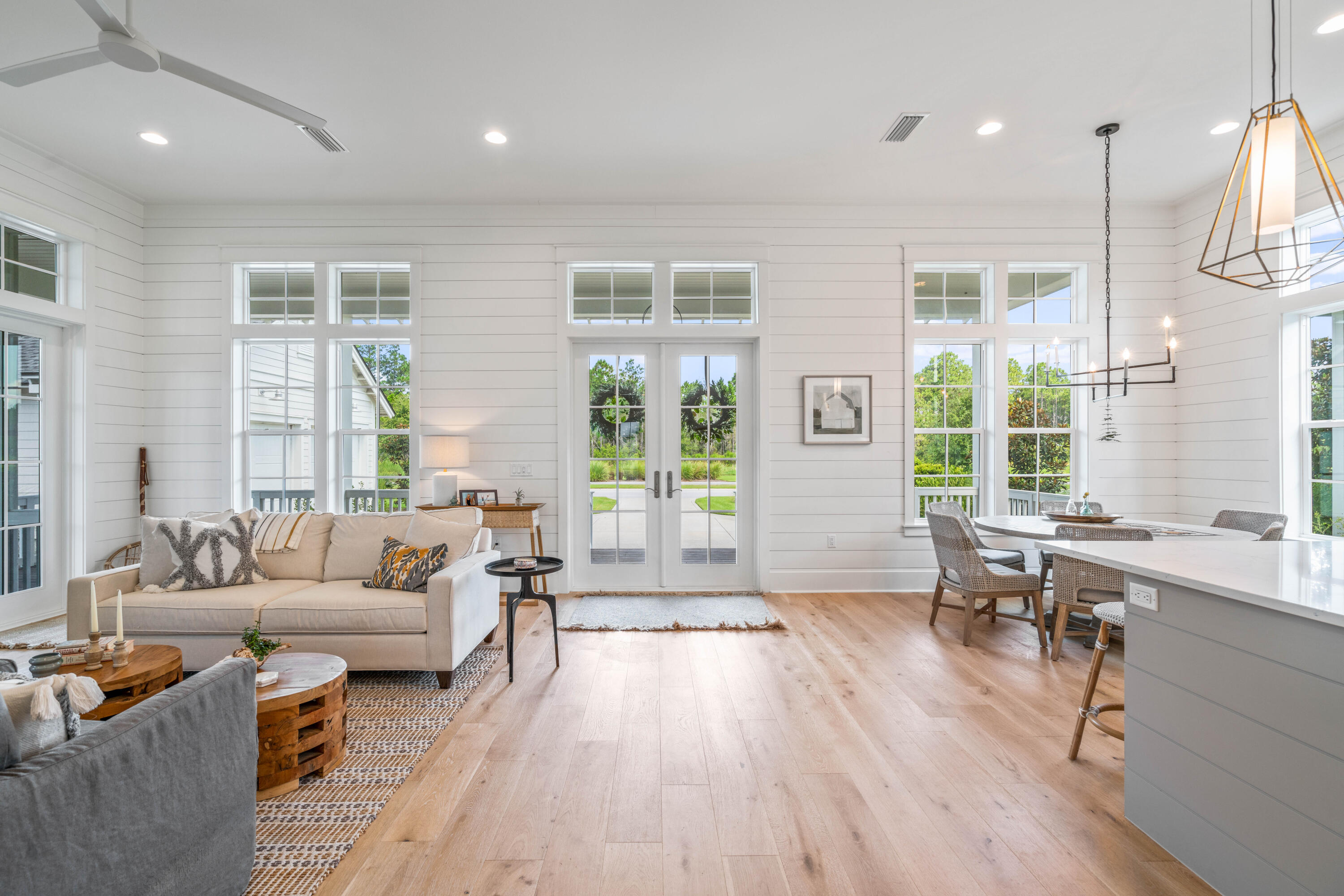 888 Pathways Dr Inlet Beach Inlet Beach, FL 32461 - Photo 19 of 43 a living room with furniture wooden floor and a large window