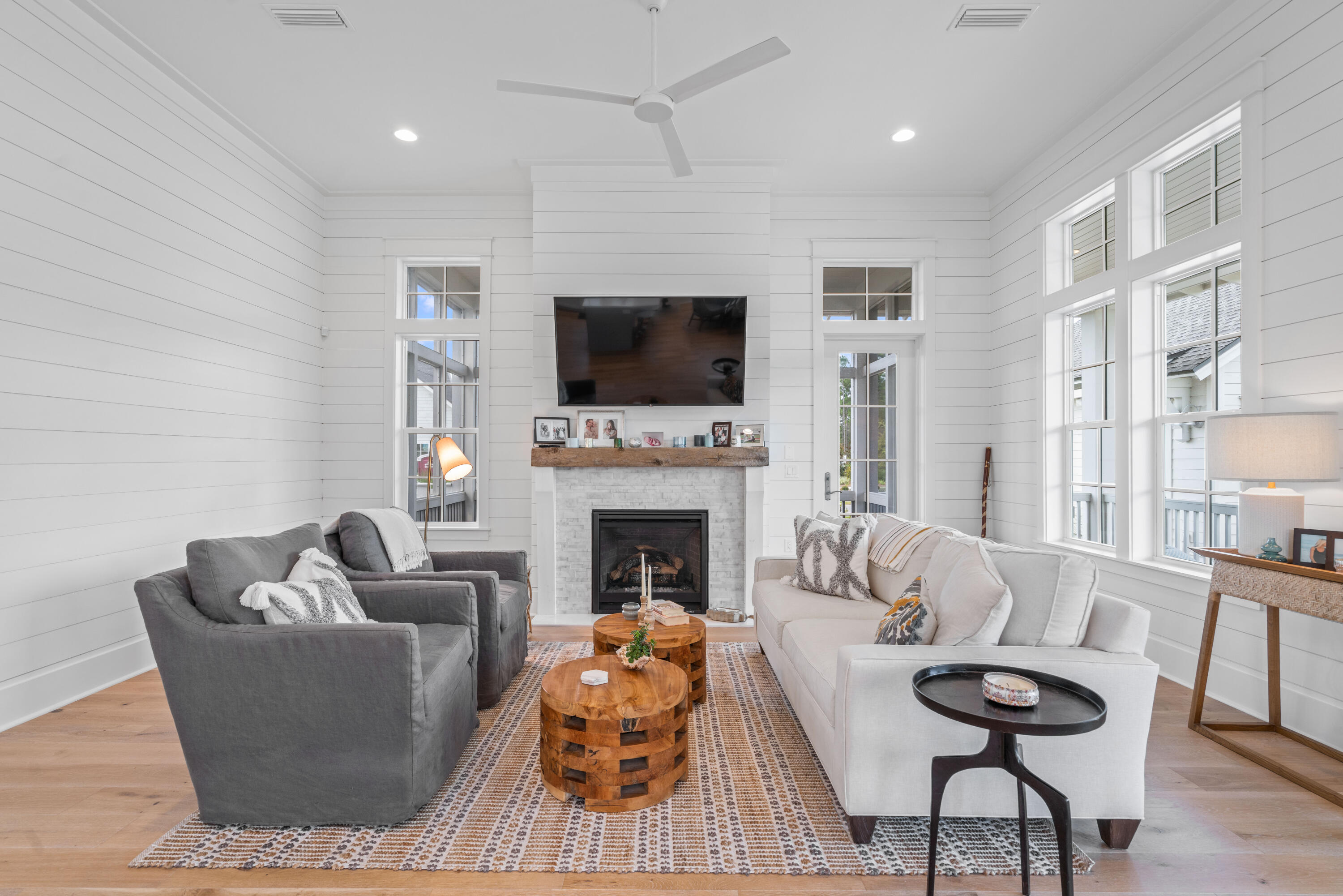 888 Pathways Dr Inlet Beach Inlet Beach, FL 32461 - Photo 20 of 43 a living room with furniture a fireplace and a flat screen tv
