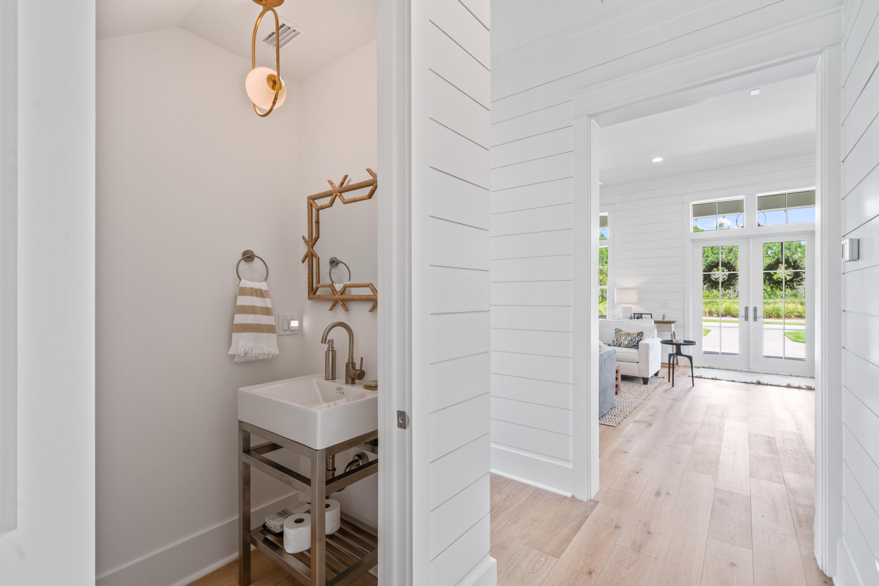888 Pathways Dr Inlet Beach Inlet Beach, FL 32461 - Photo 21 of 43 a bathroom with a sink a mirror and a shower